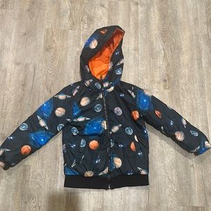 Boys reversible planet jacket with orange. Size 5.